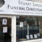 Window display of Stuart Taylor Funeral Directors Ltd based in Wall Heath.
